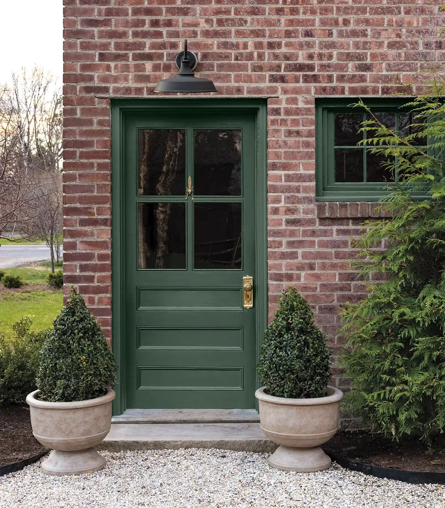 red-brick-exterior-green-front-door